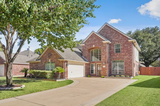 front view of a house and a yard