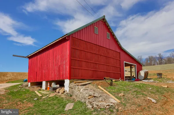 a view of a backyard with a tub