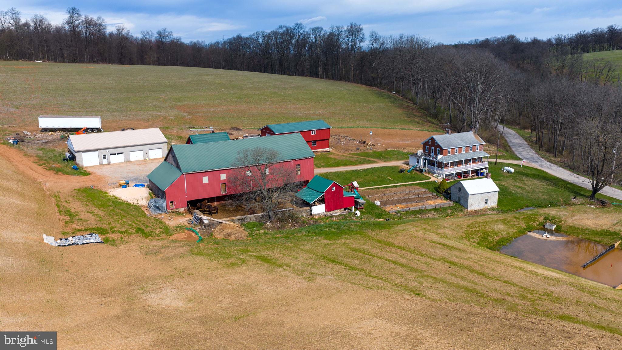 1001 Kirchner Road New Freedom, PA 17349 - Photo 3 of 37 an aerial view of a house with a yard and a lake view