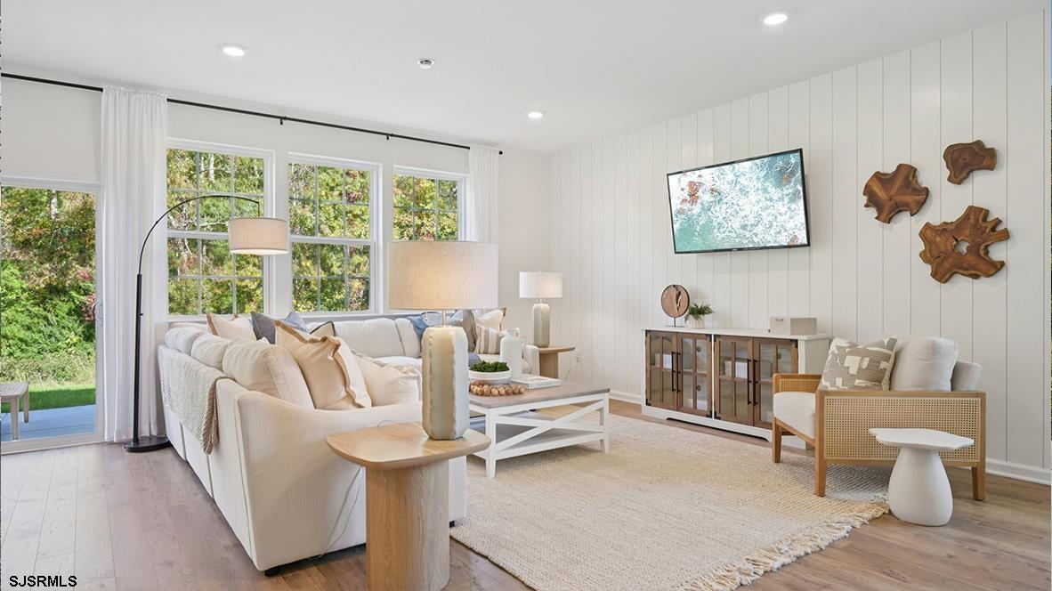 507 Scotty Boulevard, Unit 1301 Rio Grande, NJ 08242 - Photo 9 of 43 a living room with furniture and a large window