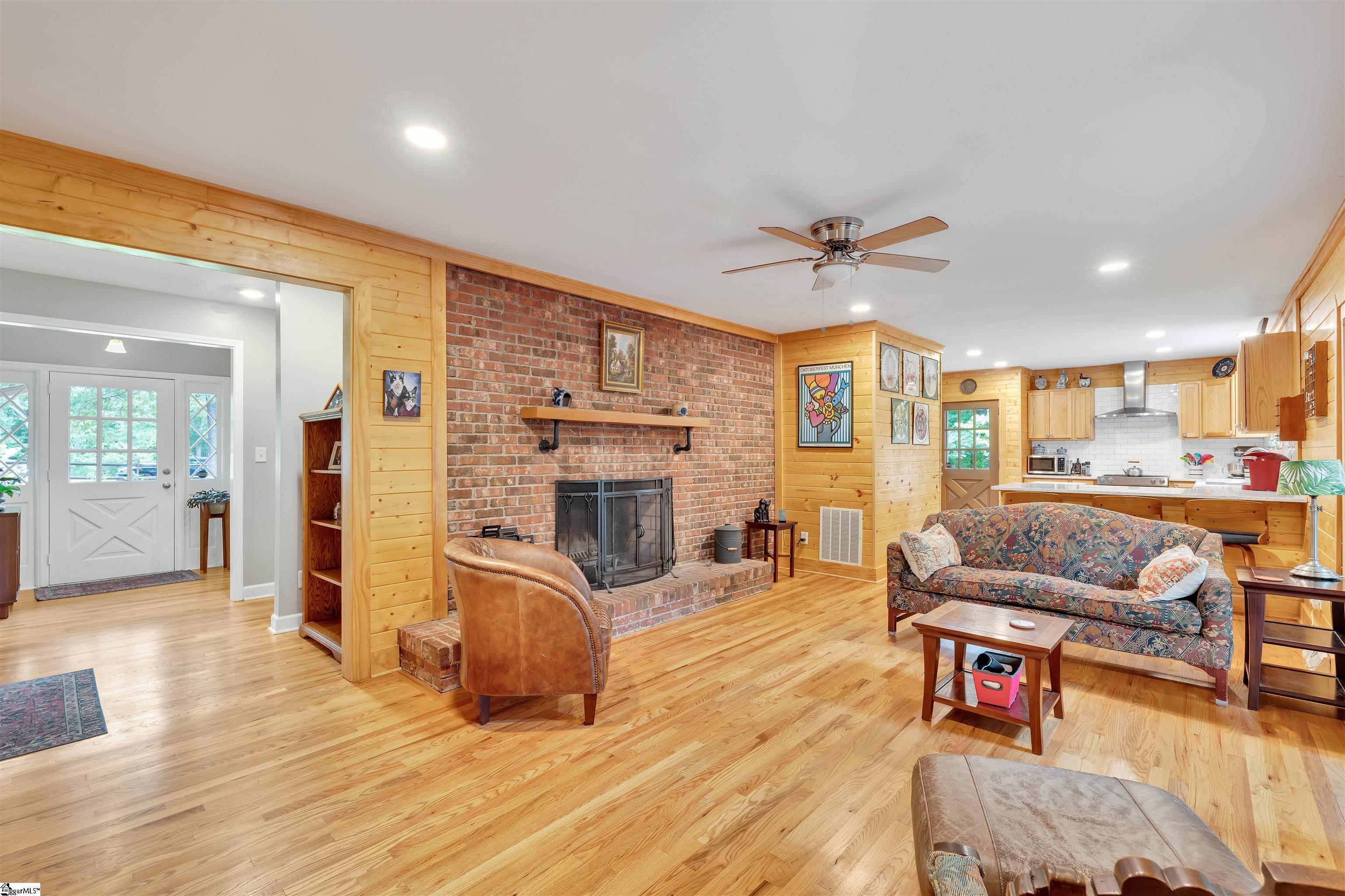 570 South Buckhorn Road Greenville, SC 29609 - Photo 7 of 43 Hardwood Floors, Brick Fireplace, Wood Mantle