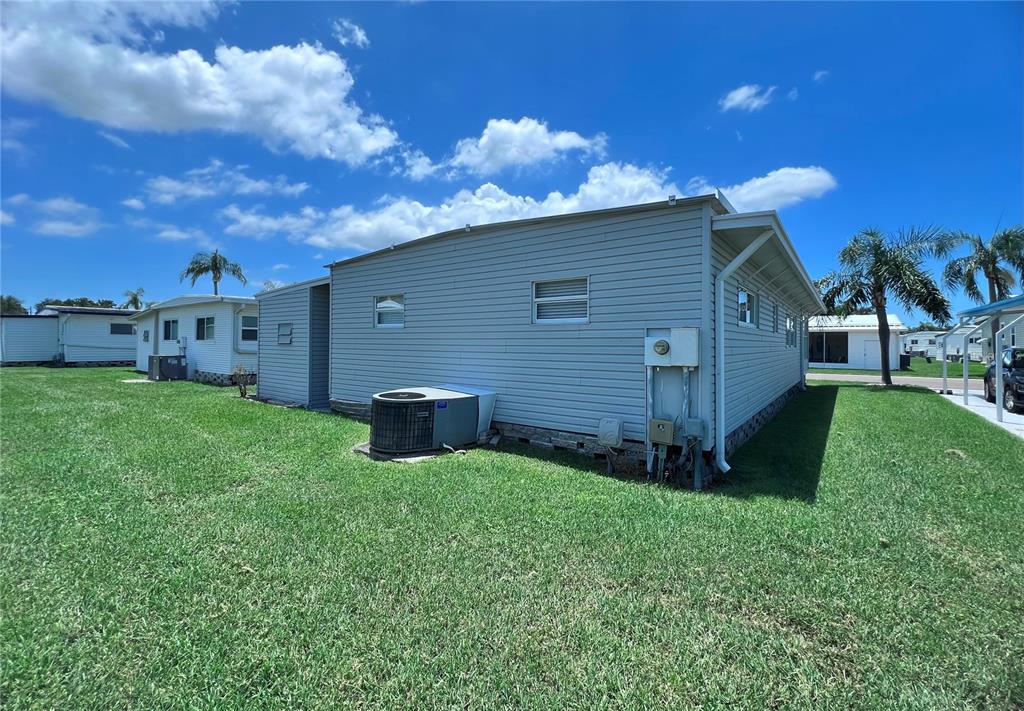 1100 South Belcher Road, Unit 270 Largo, FL 33771 - Photo 31 of 32 a view of a backyard with a garden