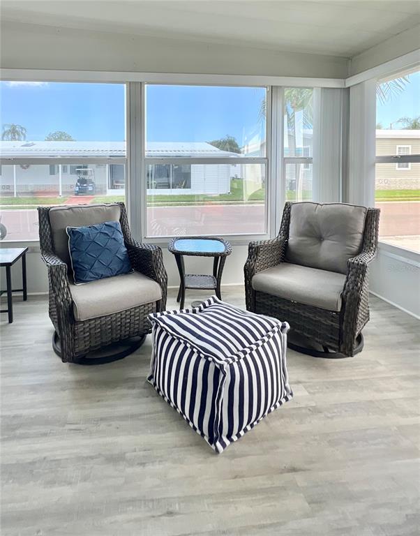 1100 South Belcher Road, Unit 270 Largo, FL 33771 - Photo 6 of 32 a living room with furniture and windows