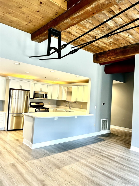 12 Brookside Road, Unit 3 Westford, MA 01886 - Photo 11 of 28 a view of a kitchen with a sink