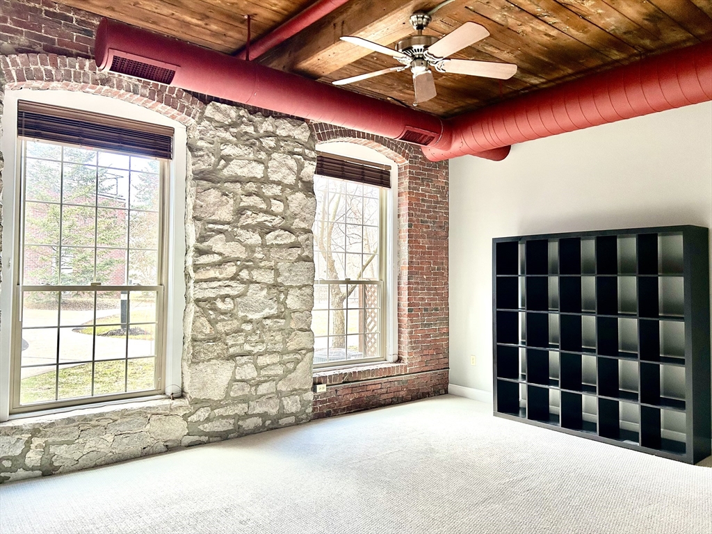 12 Brookside Road, Unit 3 Westford, MA 01886 - Photo 19 of 28 a view of a room with a large window