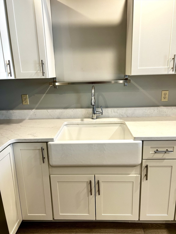12 Brookside Road, Unit 3 Westford, MA 01886 - Photo 9 of 28 a close view of sink and cabinets