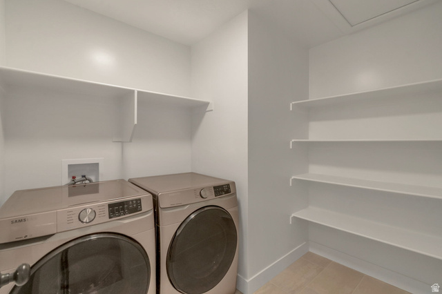 30 South Moonlit Road Mapleton, UT 84664 - Photo 24 of 25 Washer/Dryer included. Dedicated utility room featuring light-toned flooring and white walls