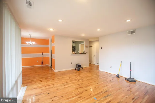 a view of a room with room and windows