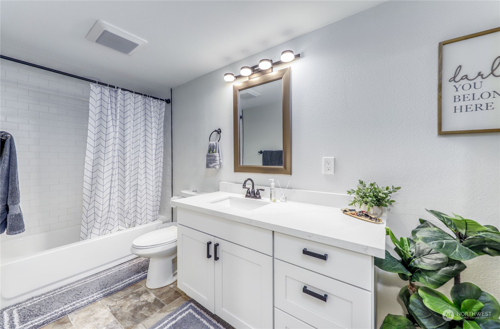 2820 Pine Road Northeast Bremerton, WA 98310 - Photo 29 of 35 a bathroom with a sink a toilet and a large mirror
