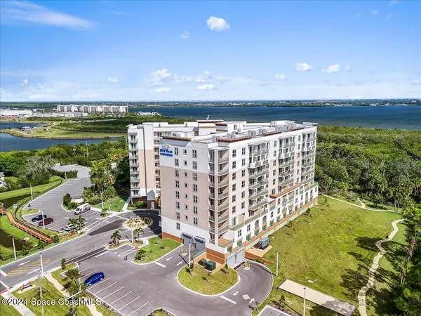 a view of swimming pool with outdoor seating