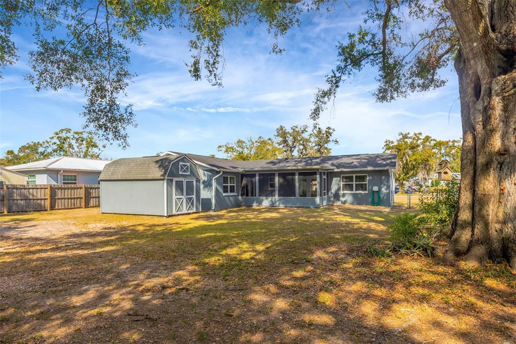 609 King Henry Court Seffner, FL 33584 - Photo 36 of 42 a front view of a house with a garden