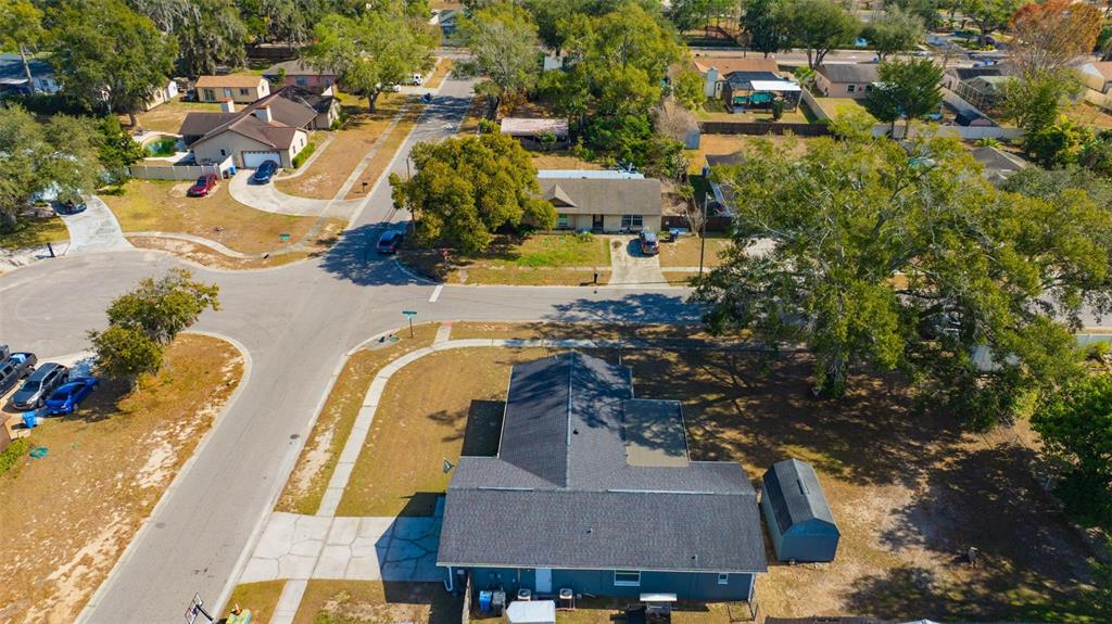 609 King Henry Court Seffner, FL 33584 - Photo 39 of 42 an aerial view of residential houses with outdoor space