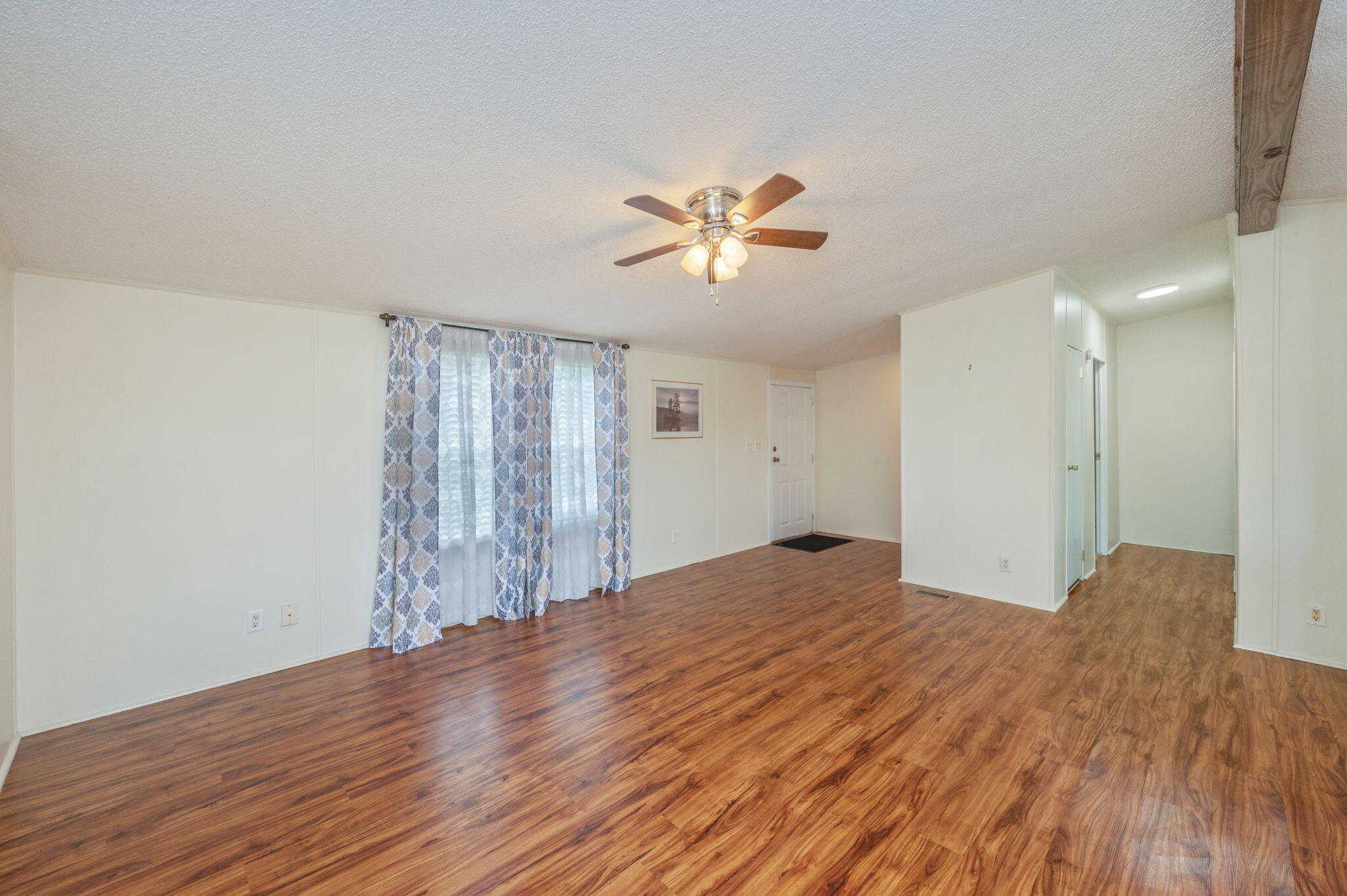 1314 Riddle Drive Westville, FL 32464 - Photo 7 of 35 a bedroom with a bed and a chandelier