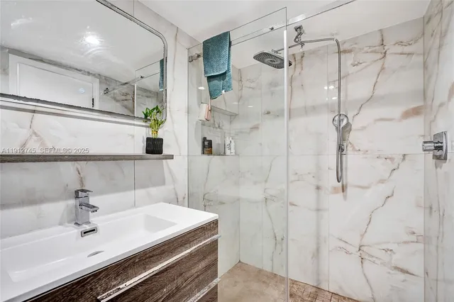a bathroom with a sink and a shower