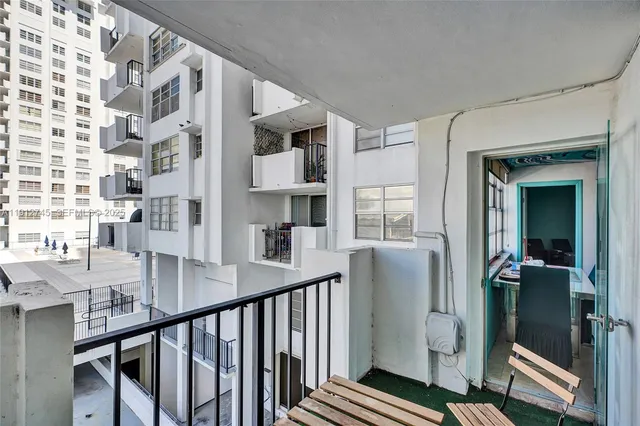 a view of a living room and entry way