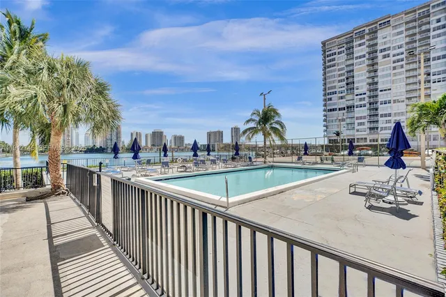 a view of swimming pool from a balcony