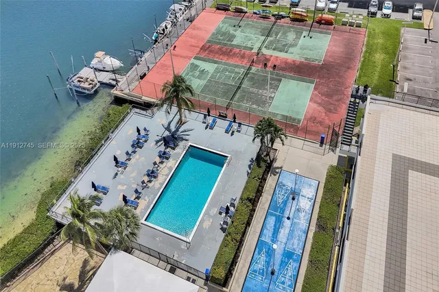 a view of a chairs and table on the deck