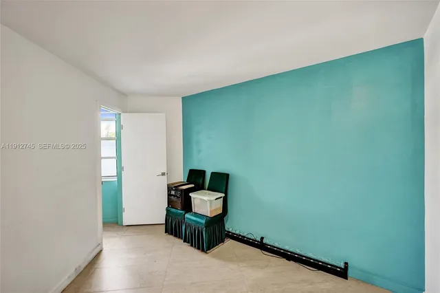 a room with furniture and a window