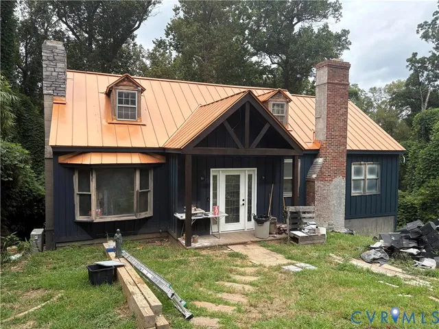 a front view of house with yard