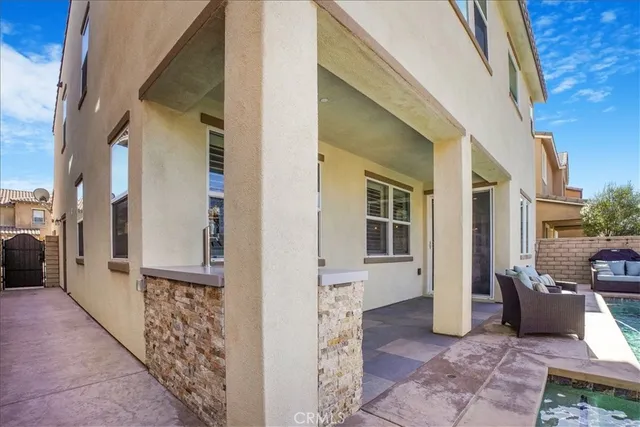 an aerial view of a house with a lake view