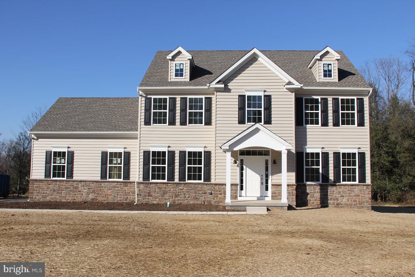 114 Orchard Road Perkasie, PA 18944 - Photo 14 of 17 a front view of a house with a yard