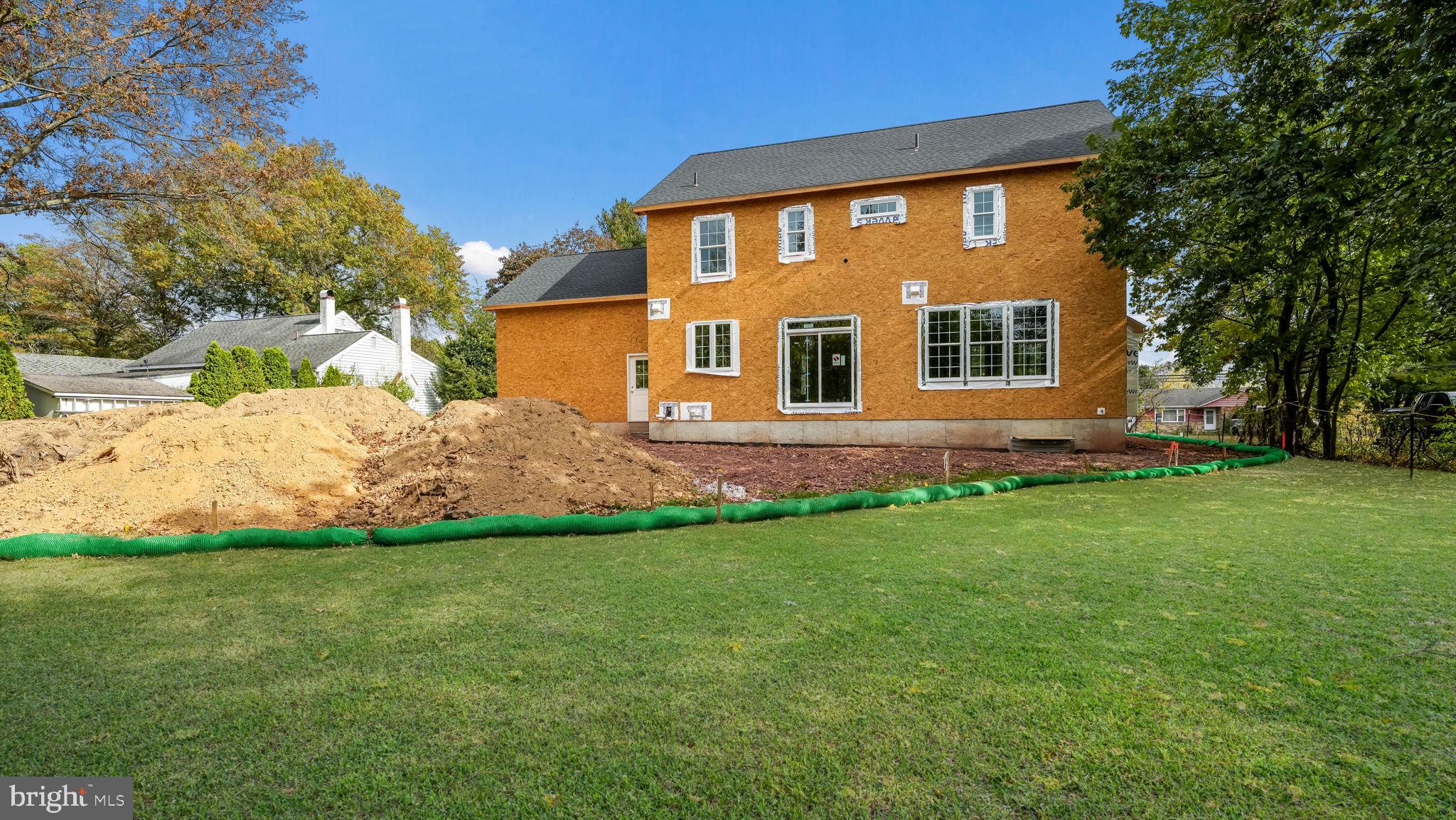 114 Orchard Road Perkasie, PA 18944 - Photo 6 of 17 a front view of a house with a yard