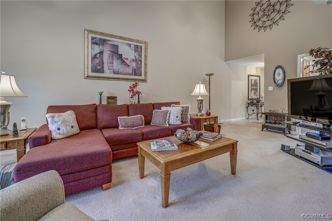 1402 Quiet Lake Loop Midlothian, VA 23114 - Photo 22 of 50 a living room with furniture and a flat screen tv
