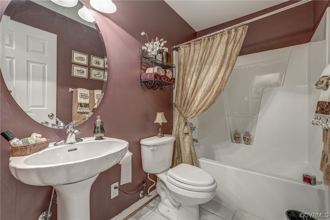 1402 Quiet Lake Loop Midlothian, VA 23114 - Photo 35 of 50 a bathroom with a sink toilet and shower