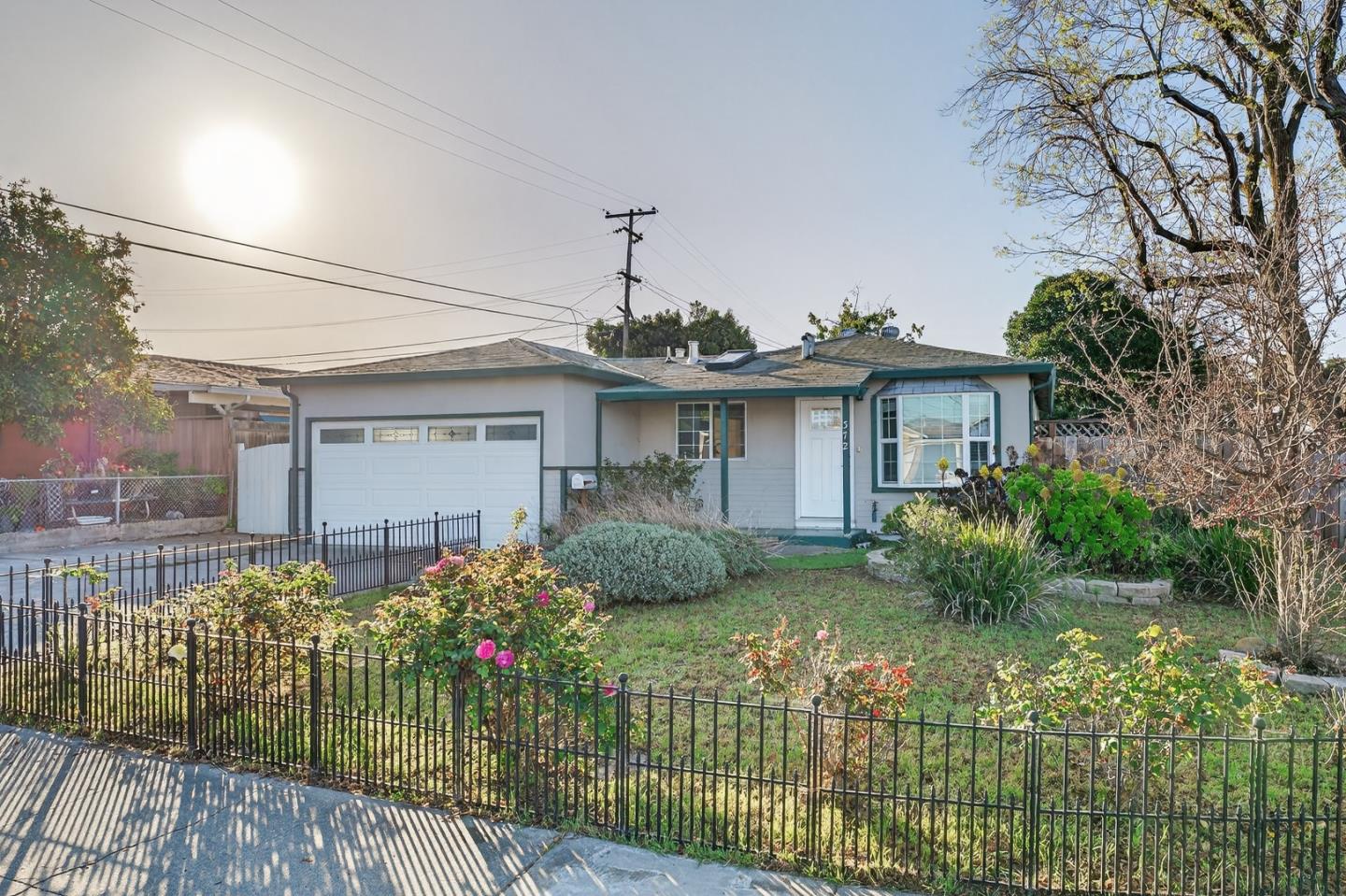 372 Gosser Street Milpitas, CA 95035 - Photo 1 of 1 a front view of a house with a garden