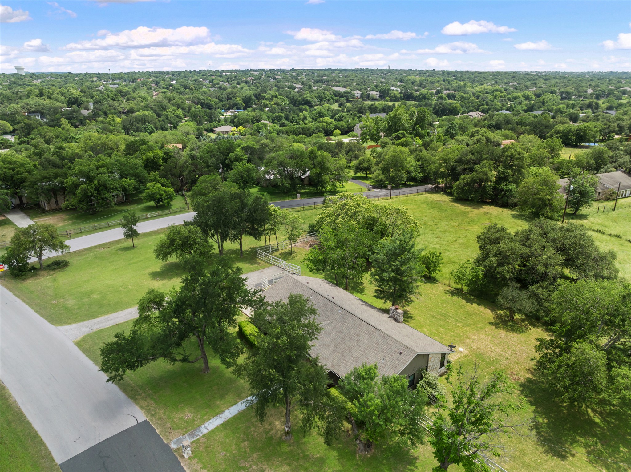 1600 Pin Oak Lane Round Rock, TX 78681 - Photo 38 of 40 Spacious property with a large, tree-lined lot and a single-story residence