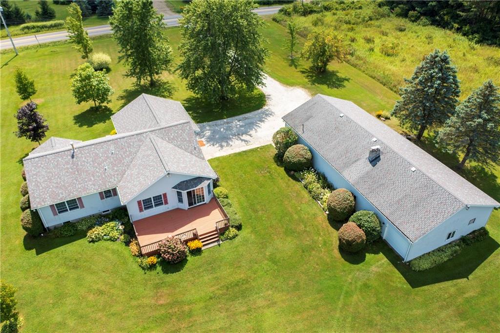 1948 Old State Road Waterford, PA 16441 - Photo 19 of 20 an aerial view of a house with swimming pool and large trees