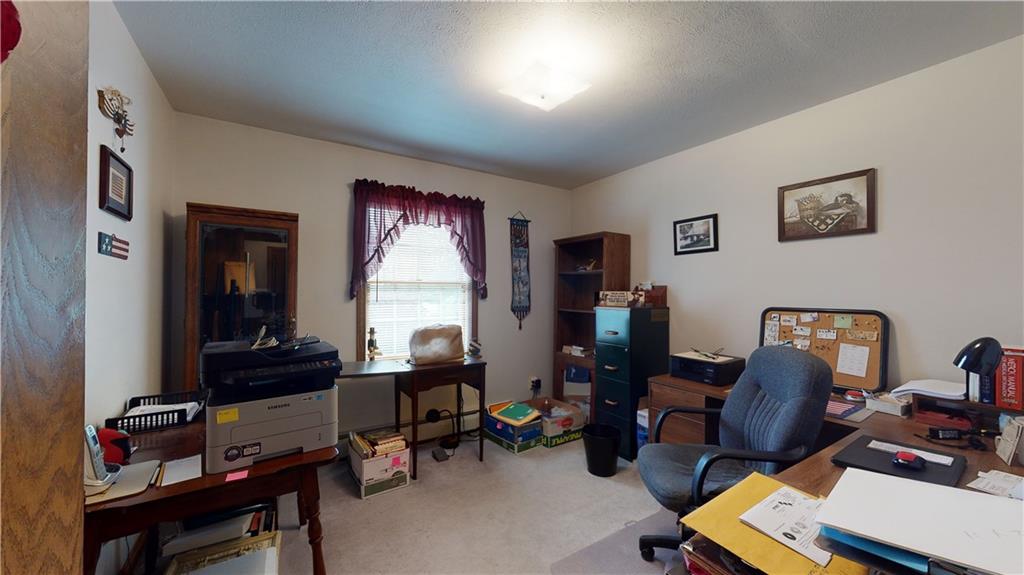 1948 Old State Road Waterford, PA 16441 - Photo 6 of 20 a view of a workspace with furniture and a window