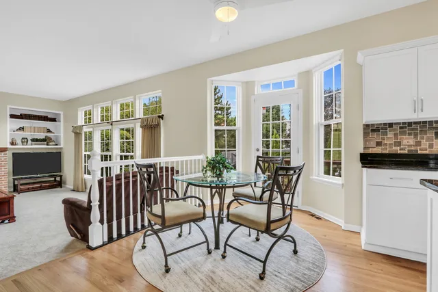 a view of a livingroom with furniture and a flat screen tv