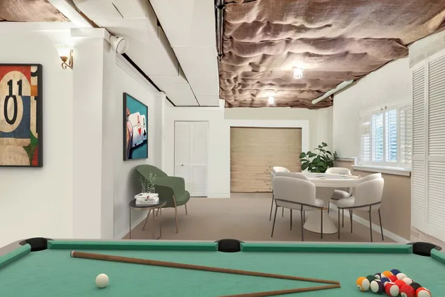 a view of a dining room with furniture and a potted plant