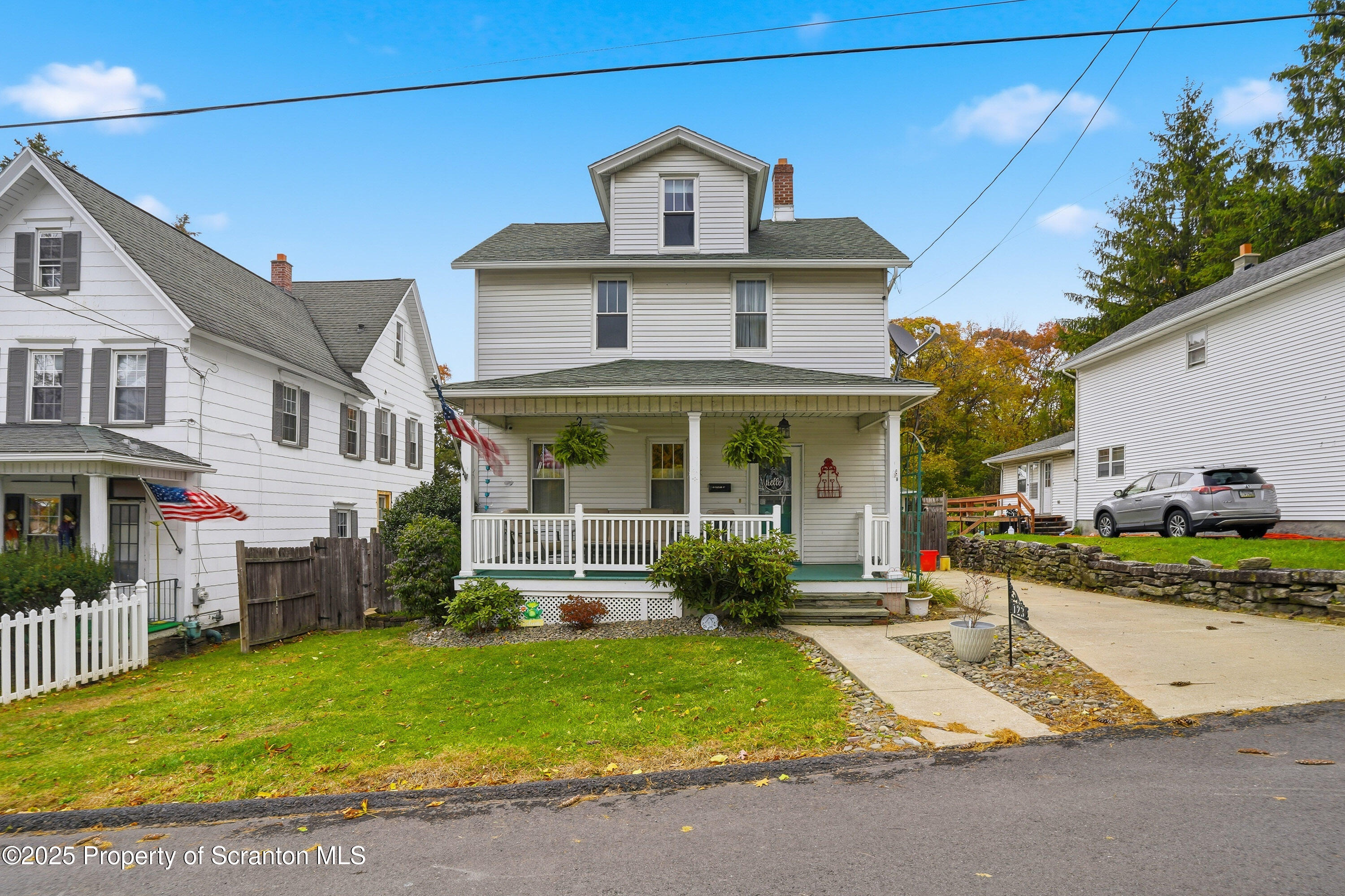 123 William Street Scranton, PA 18510 - Photo 2 of 25 a front view of a house with garden