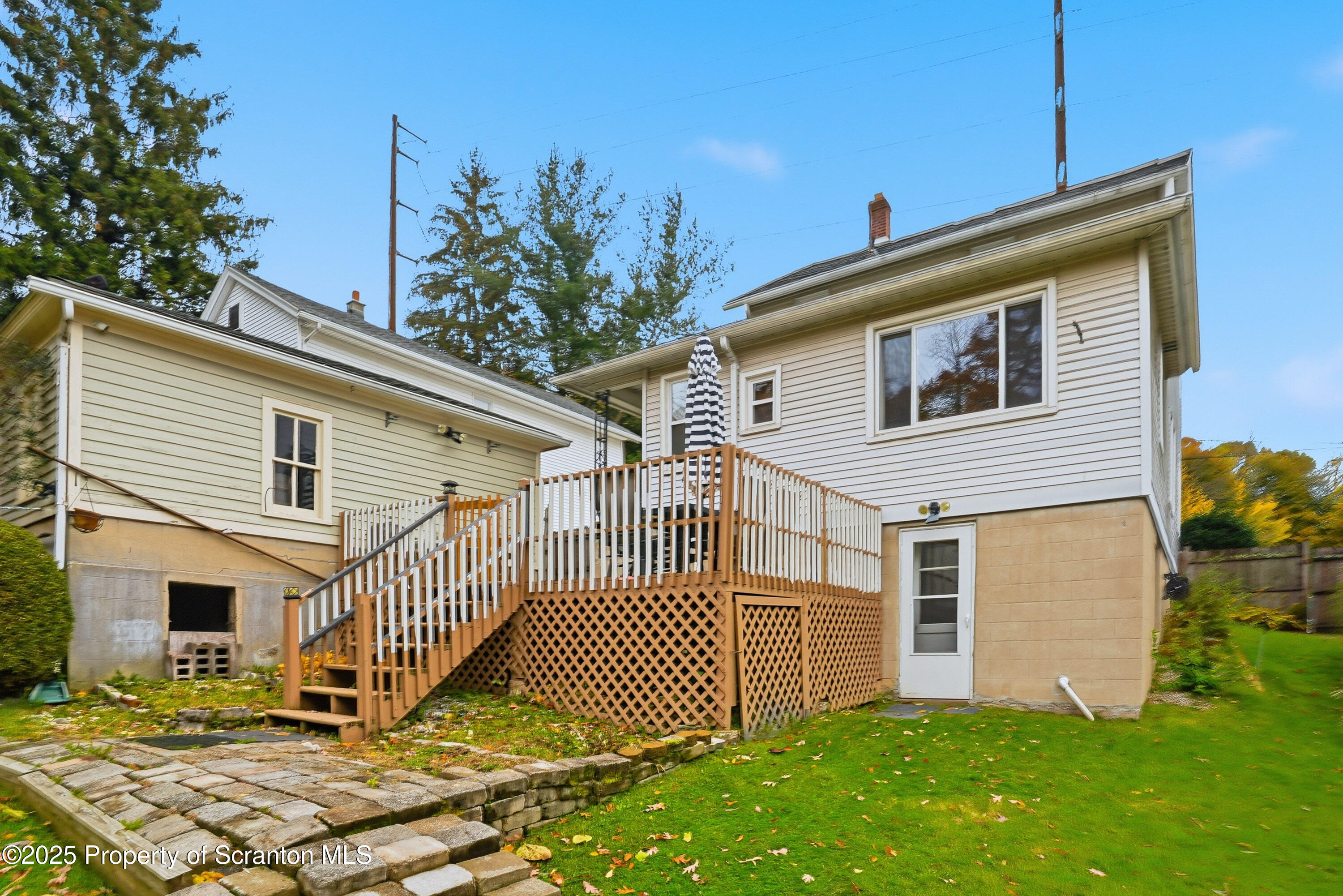 123 William Street Scranton, PA 18510 - Photo 25 of 25 a front view of a house with a garden