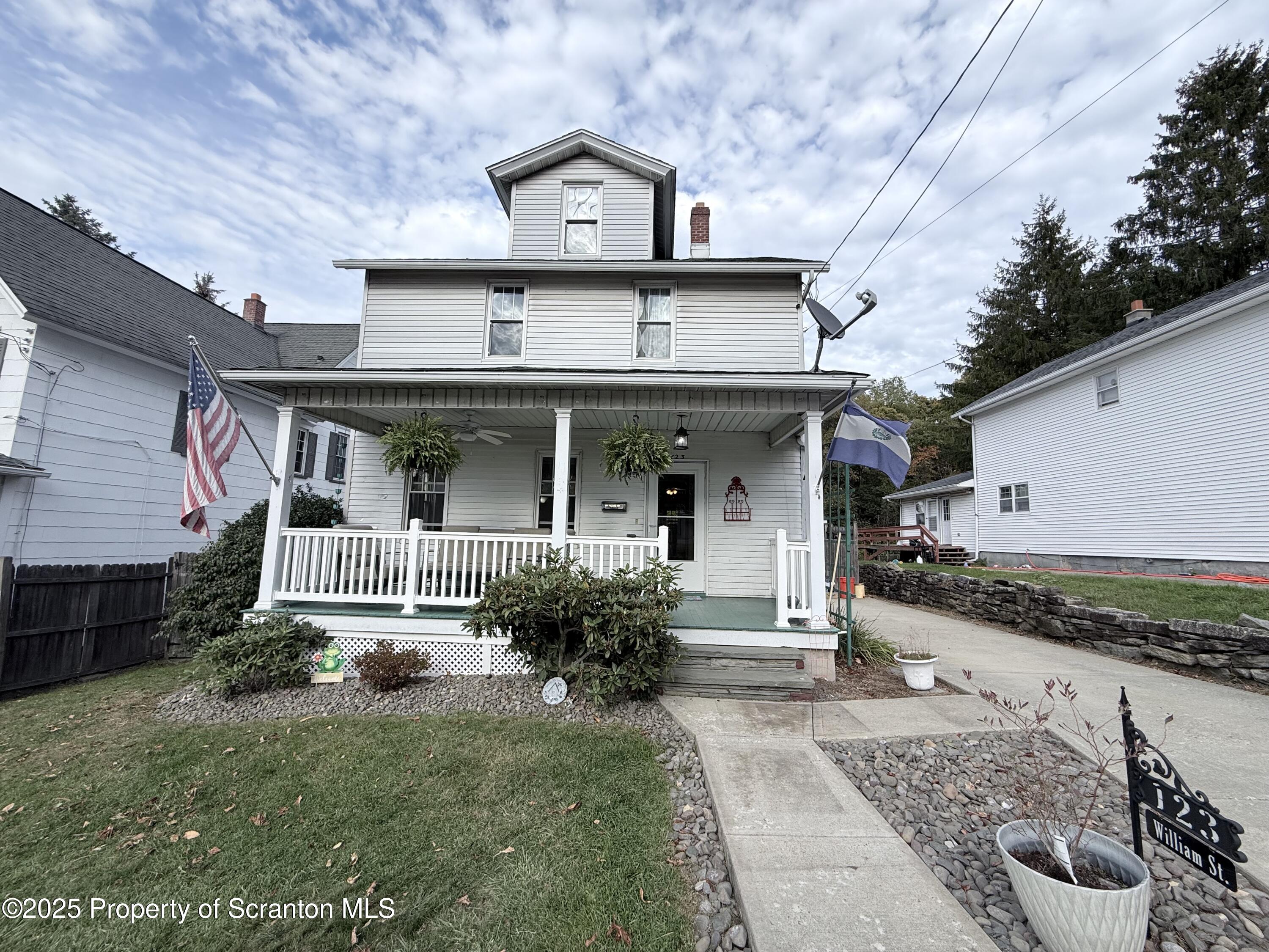 123 William Street Scranton, PA 18510 - Photo 5 of 25 a front view of a house with garden