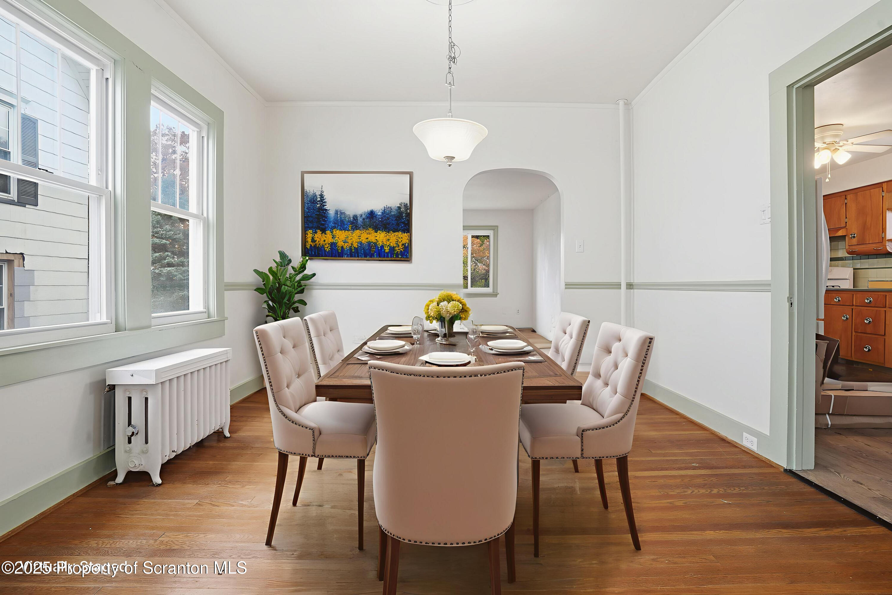 123 William Street Scranton, PA 18510 - Photo 6 of 25 a view of a dining room with furniture window and wooden floor