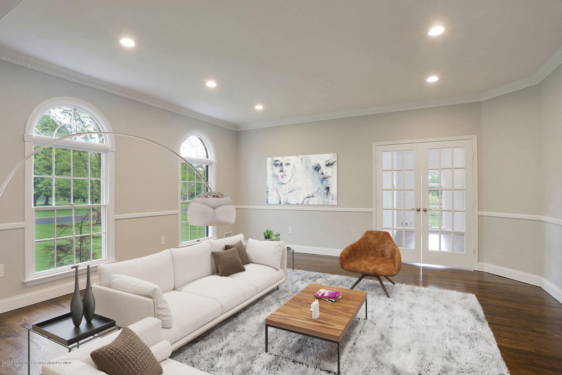 7 Pheasant Road Colts Neck, NJ 07722 - Photo 8 of 50 a living room with furniture and a large window