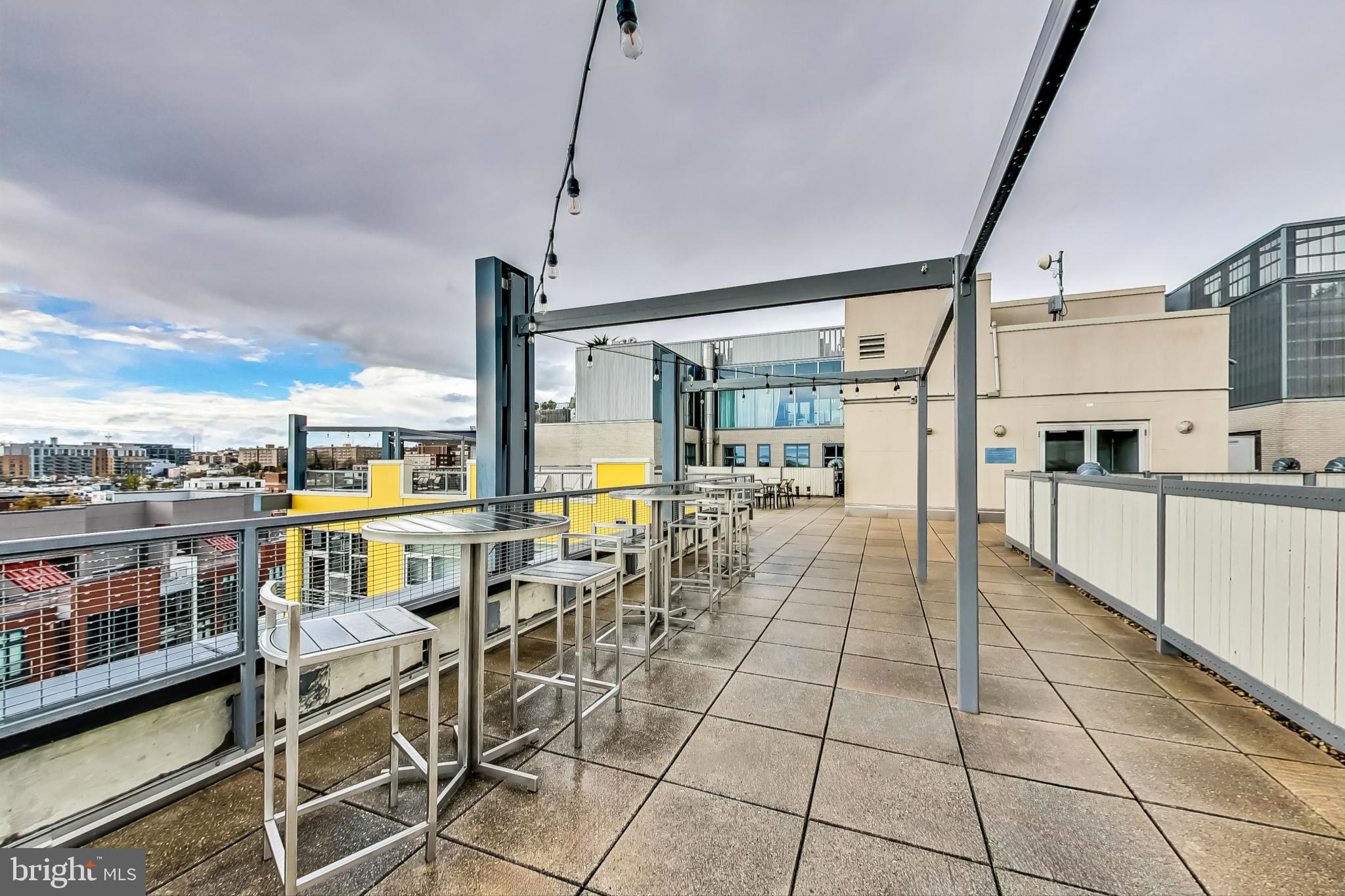929 Florida Avenue Northwest, Unit 4008 Washington, DC 20001 - Photo 22 of 33 a view of a swimming pool with furniture