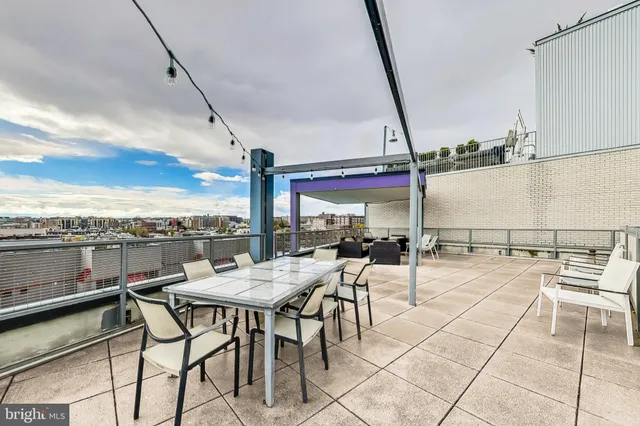 a view of a terrace with furniture and sitting area