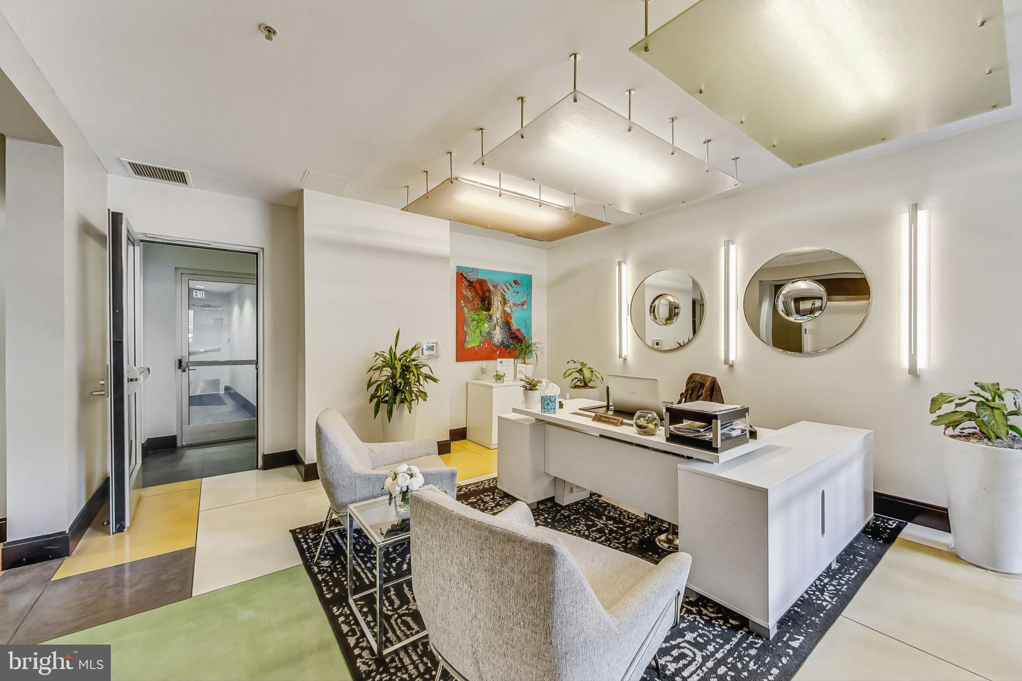 929 Florida Avenue Northwest, Unit 4008 Washington, DC 20001 - Photo 28 of 33 a living room with furniture and wooden floor