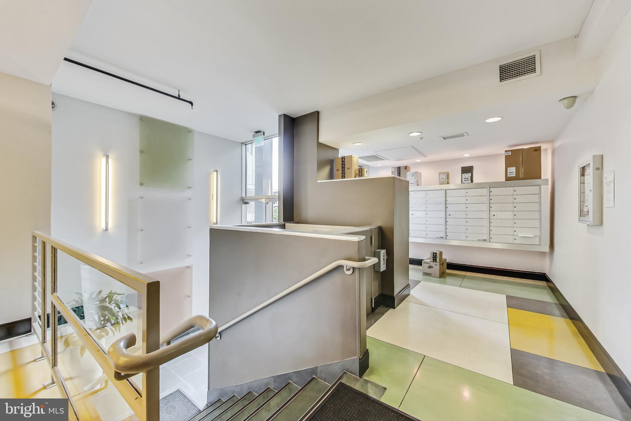929 Florida Avenue Northwest, Unit 4008 Washington, DC 20001 - Photo 29 of 33 a view of a kitchen with furniture and a window