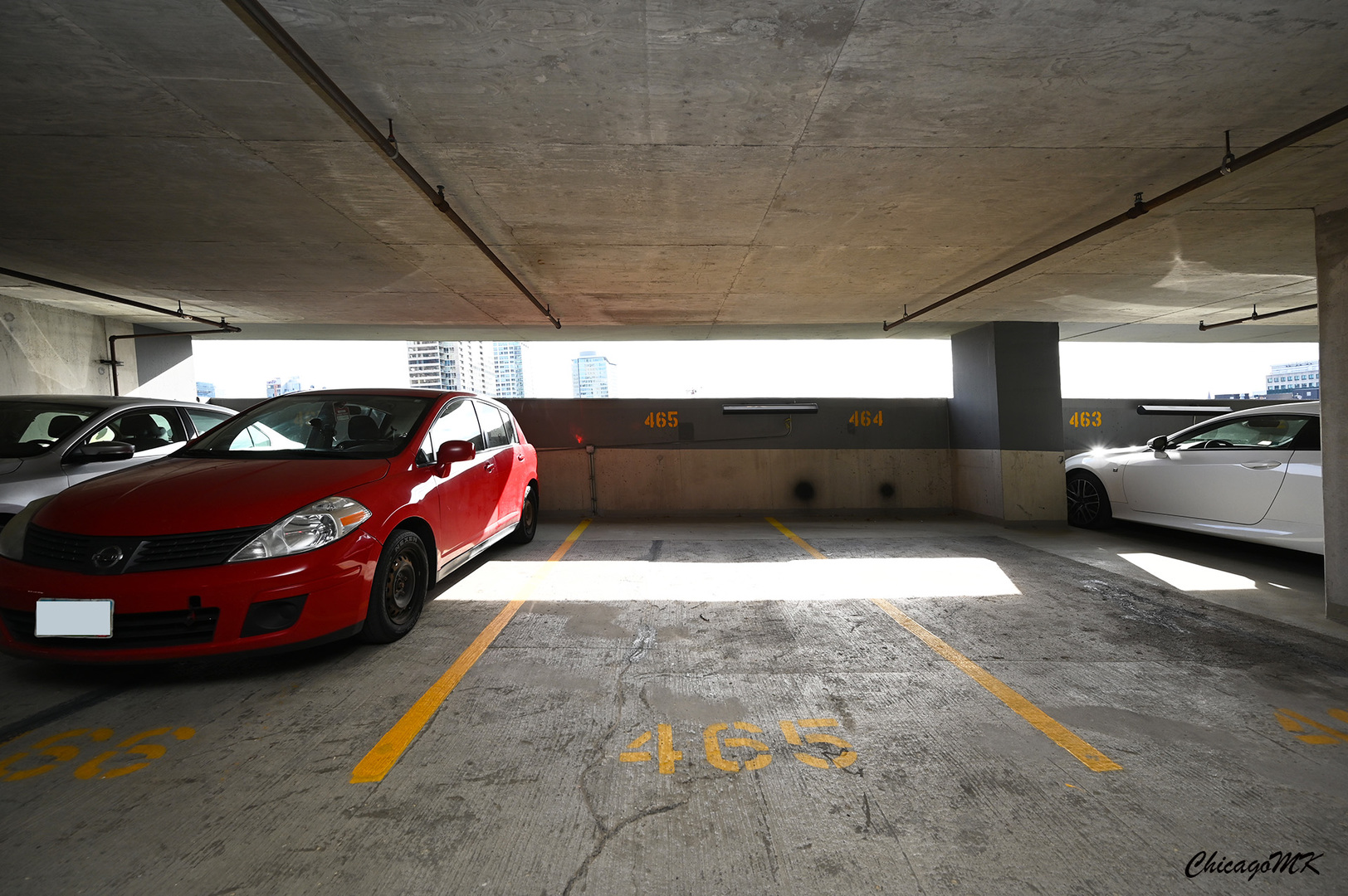 235 West Van Buren Street, Unit 2213 Chicago, IL 60607 - Photo 25 of 31 a view of parking with cars parked