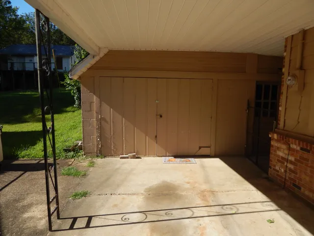 a house with trees in front of it