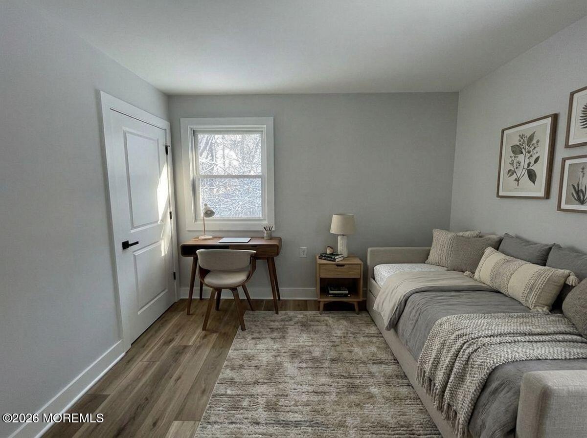 14 Churchill Road, Unit 71 Whiting, NJ 08759 - Photo 13 of 18 a bedroom with a bed and a window