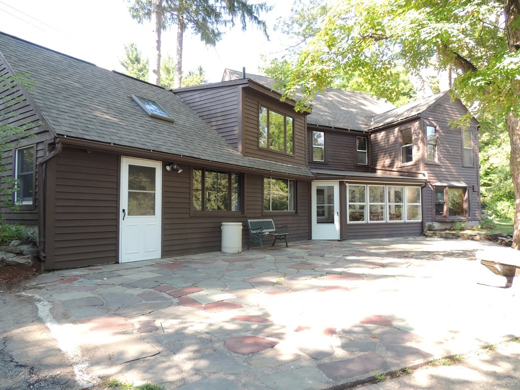 400 Lower Hampden Road Monson, MA 01057 - Photo 2 of 30 a front view of a house with a yard