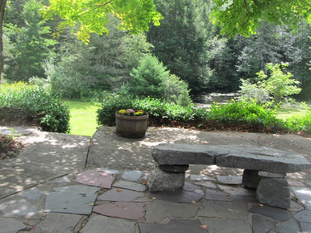 400 Lower Hampden Road Monson, MA 01057 - Photo 4 of 30 a view of a backyard with fountain plants