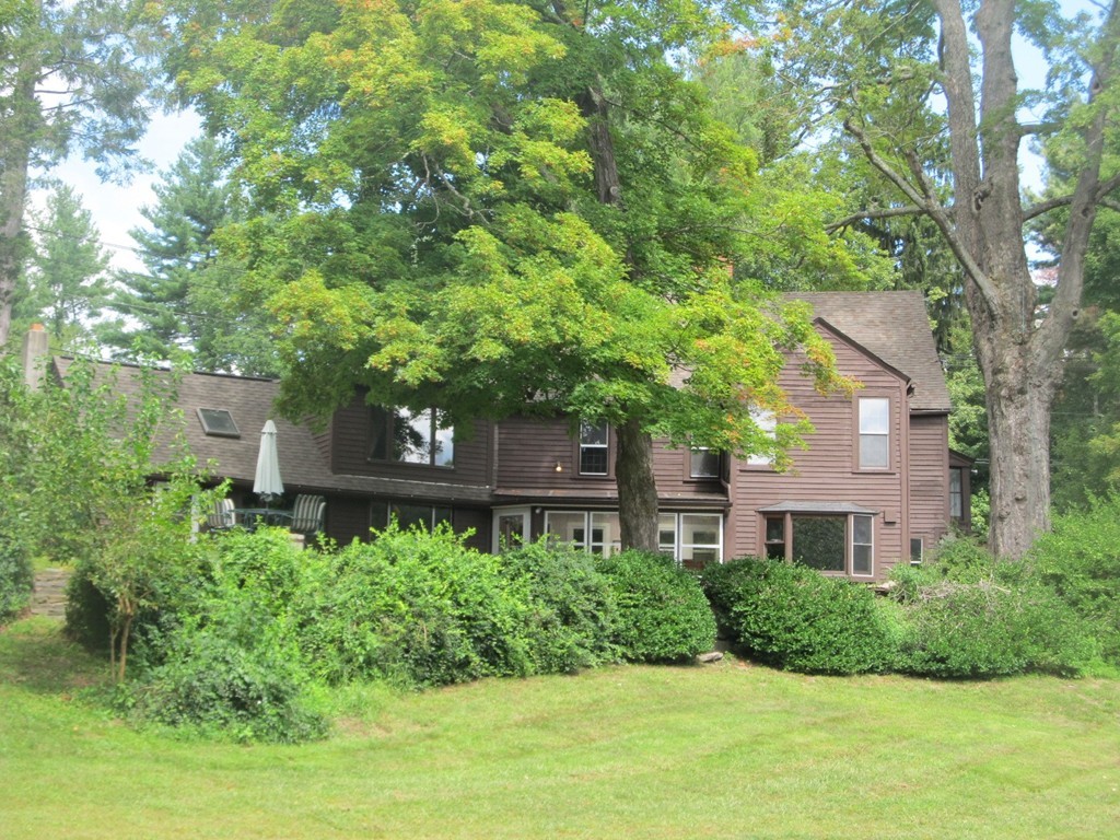 400 Lower Hampden Road Monson, MA 01057 - Photo 6 of 30 a front view of a house with a yard