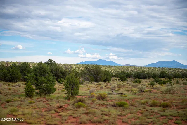 a view of mountain with lake view